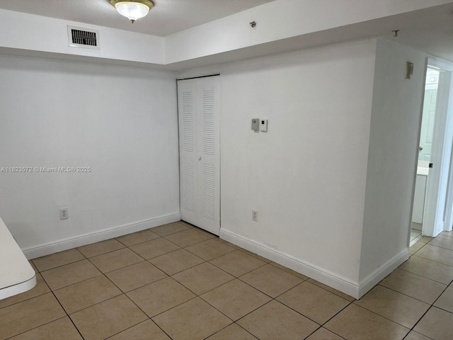 15422 SW 284th St Unit 7207, Homestead, FL 33033 - spare room featuring light tile patterned floors and a pendent fire sprinkler
