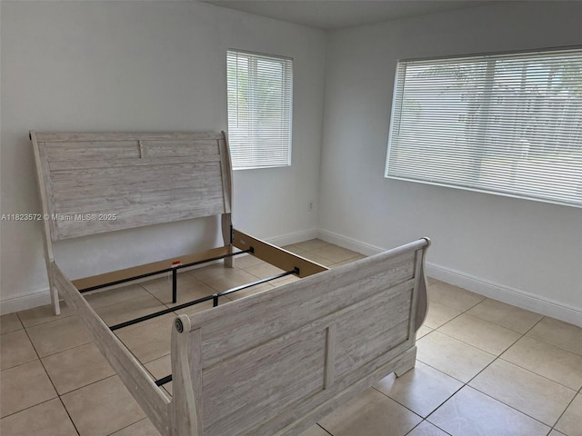 15422 SW 284th St Unit 7207, Homestead, FL 33033 - bedroom with tile patterned flooring and baseboards