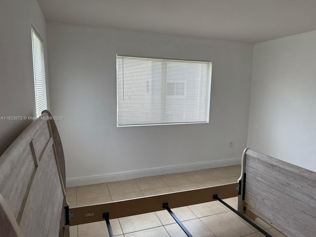 15422 SW 284th St Unit 7207, Homestead, FL 33033 - unfurnished bedroom featuring multiple windows and tile patterned floors