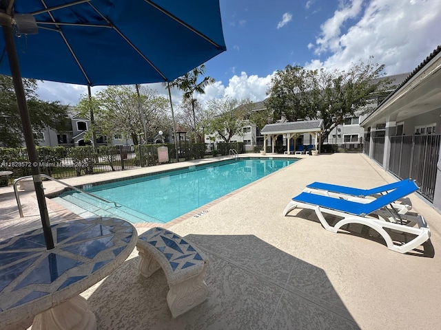 15422 SW 284th St Unit 7207, Homestead, FL 33033 - community pool featuring a patio