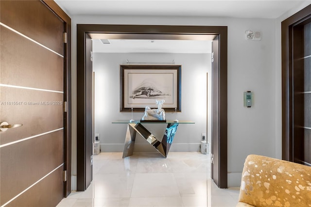 1331 Brickell Bay Dr Unit 2305, Miami, FL 33131 - hallway with light tile patterned floors
