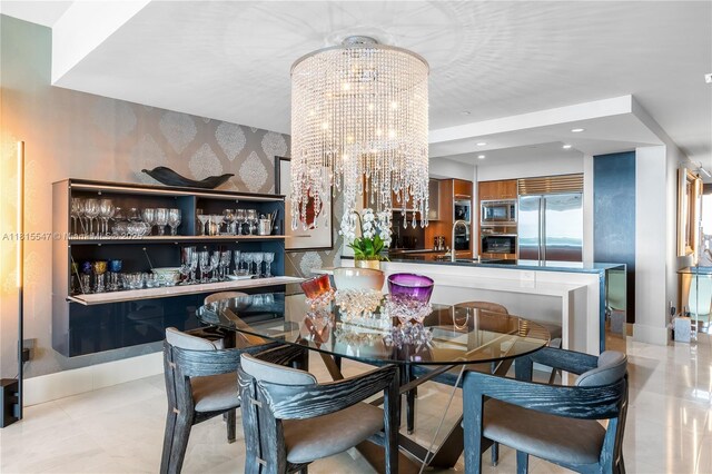 1331 Brickell Bay Dr Unit 2305, Miami, FL 33131 - dining room featuring a chandelier, wallpapered walls, light tile patterned floors, and recessed lighting