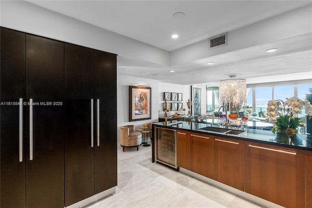1331 Brickell Bay Dr Unit 2305, Miami, FL 33131 - kitchen featuring beverage cooler, paneled built in fridge, recessed lighting, modern cabinets, and a chandelier