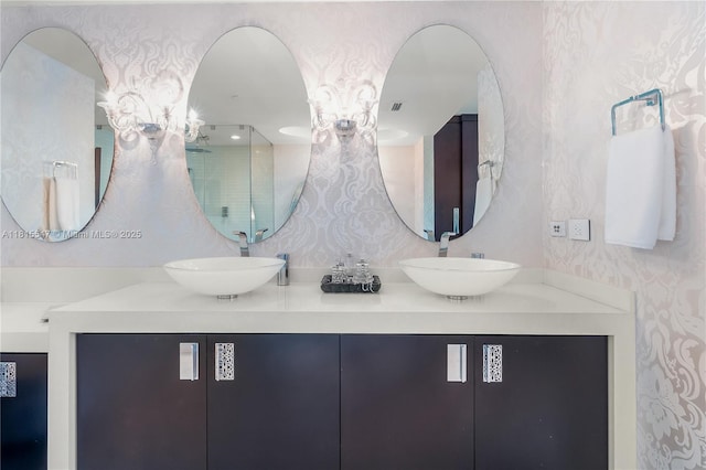 1331 Brickell Bay Dr Unit 2305, Miami, FL 33131 - full bathroom featuring double vanity and wallpapered walls