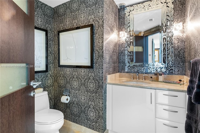 1331 Brickell Bay Dr Unit 2305, Miami, FL 33131 - bathroom featuring wallpapered walls and vanity