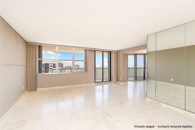 2101 S Ocean Dr Unit 2707, Hollywood, FL 33019 - unfurnished room with baseboards