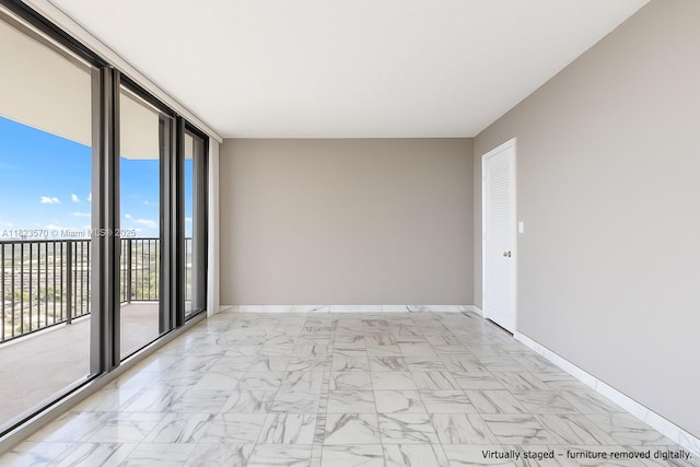 2101 S Ocean Dr Unit 2707, Hollywood, FL 33019 - unfurnished room featuring expansive windows and light marble finish flooring
