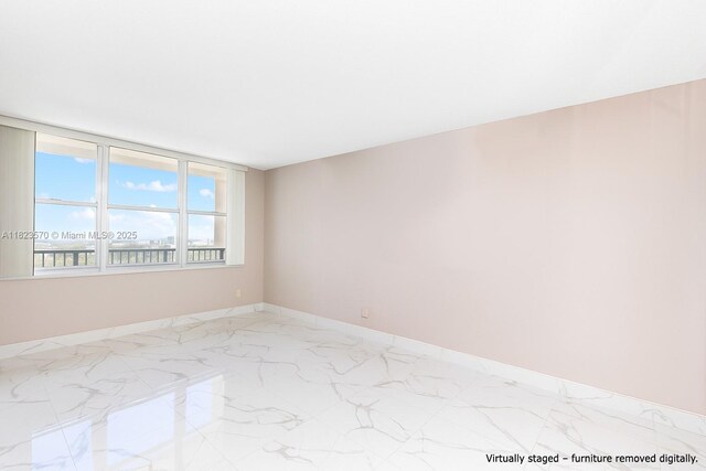 2101 S Ocean Dr Unit 2707, Hollywood, FL 33019 - empty room with light marble finish flooring