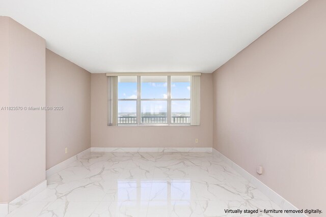 2101 S Ocean Dr Unit 2707, Hollywood, FL 33019 - spare room with marble finish flooring and baseboards
