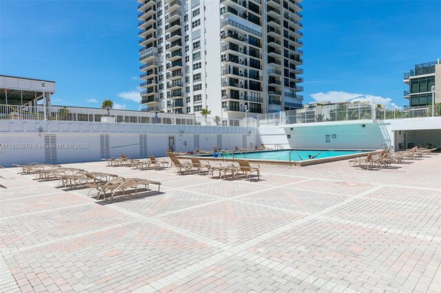2101 S Ocean Dr Unit 2707, Hollywood, FL 33019 - community pool featuring a patio