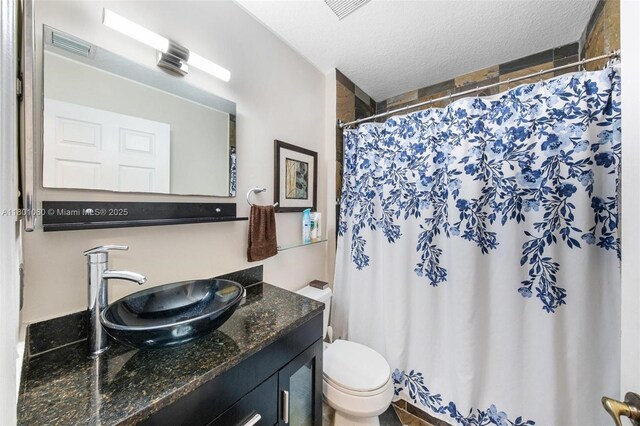 3869 NW 92nd Ave, Sunrise, FL 33351 - full bathroom featuring vanity, a textured ceiling, and a shower with shower curtain