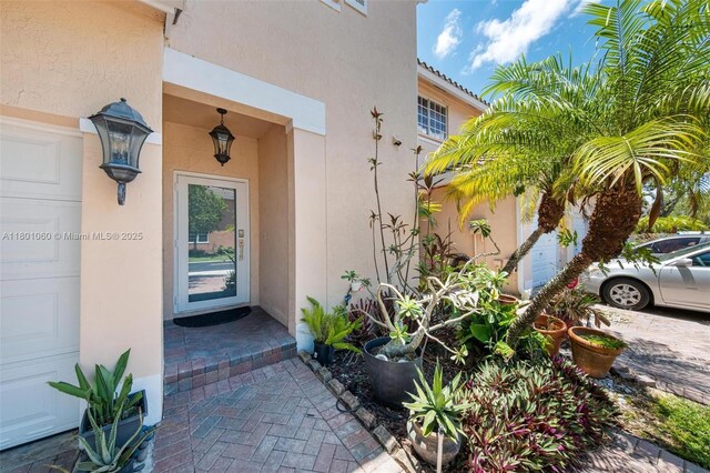 3869 NW 92nd Ave, Sunrise, FL 33351 - doorway to property with stucco siding