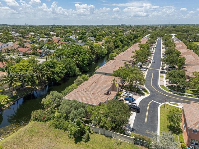 3869 NW 92nd Ave, Sunrise, FL 33351 - aerial perspective of suburban area with a large body of water