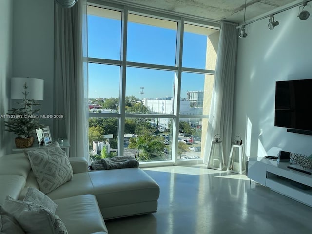 2001 Biscayne Blvd Unit 3608, Miami, FL 33137 - living room featuring plenty of natural light, a wall of windows, and finished concrete flooring