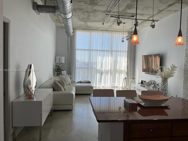 2001 Biscayne Blvd Unit 3608, Miami, FL 33137 - living area with concrete flooring and track lighting