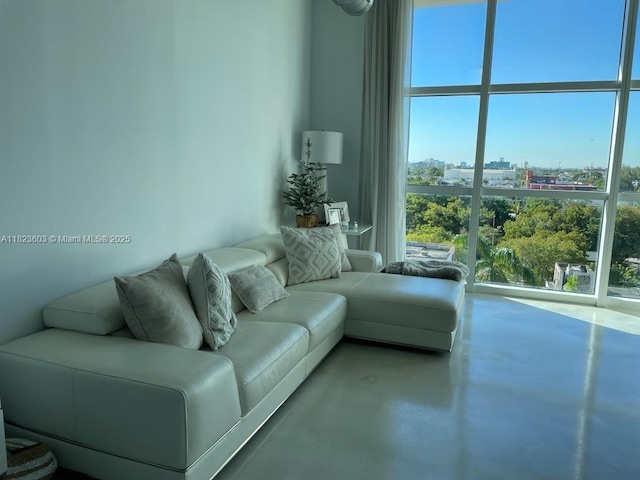 2001 Biscayne Blvd Unit 3608, Miami, FL 33137 - living area featuring finished concrete floors and a city view