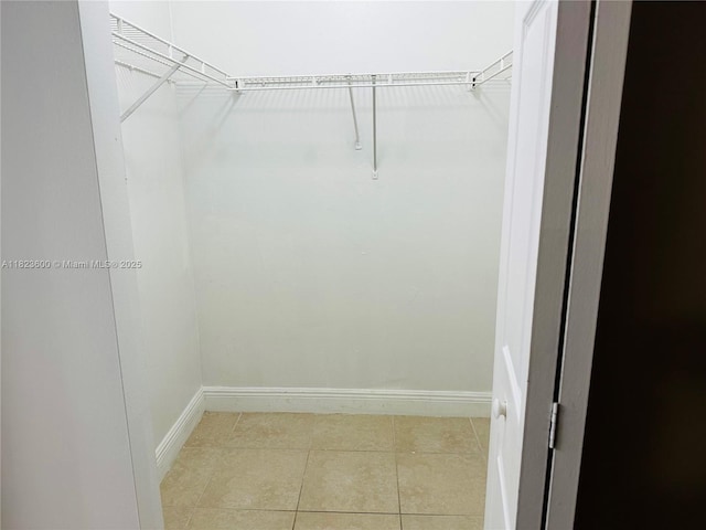 15221 SW 80th St Unit 304, Miami, FL 33193 - spacious closet with light tile patterned floors