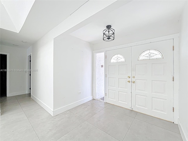 4996 SW 95th Ave, Cooper City, FL 33328 - foyer featuring light tile patterned floors