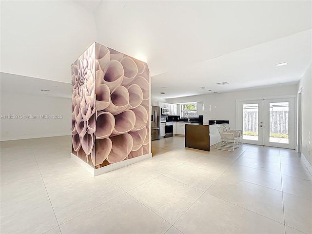 4996 SW 95th Ave, Cooper City, FL 33328 - detailed view of appliances with stainless steel finishes and french doors