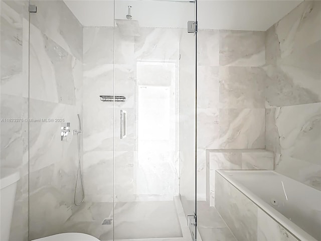 4996 SW 95th Ave, Cooper City, FL 33328 - bathroom with a marble finish shower, a garden tub, and tile walls