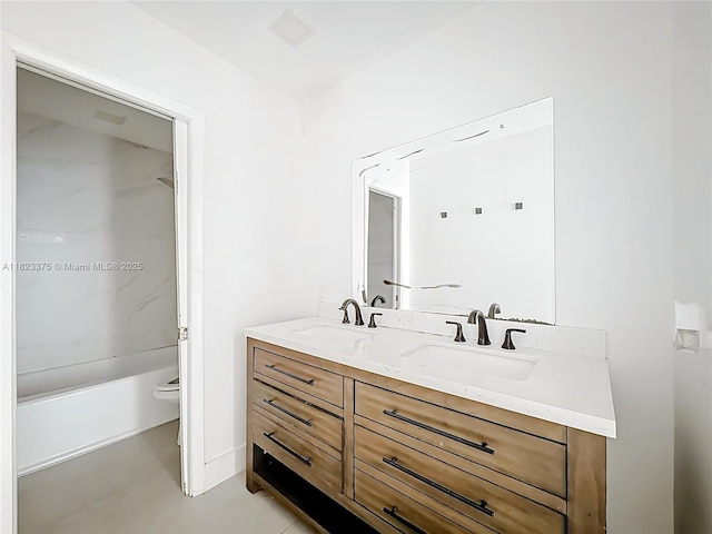4996 SW 95th Ave, Cooper City, FL 33328 - bathroom featuring double vanity and shower / tub combination