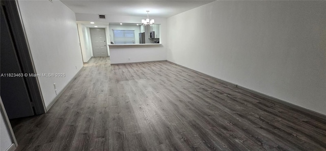 100 SW 130th Ter Unit 309C, Pembroke Pines, FL 33027 - unfurnished living room with a chandelier and wood finished floors
