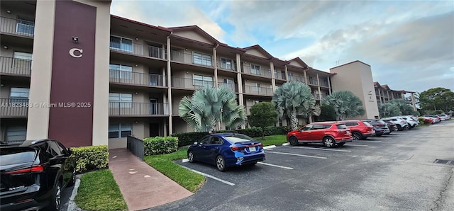 100 SW 130th Ter Unit 309C, Pembroke Pines, FL 33027 - view of apartment building / complex with uncovered parking