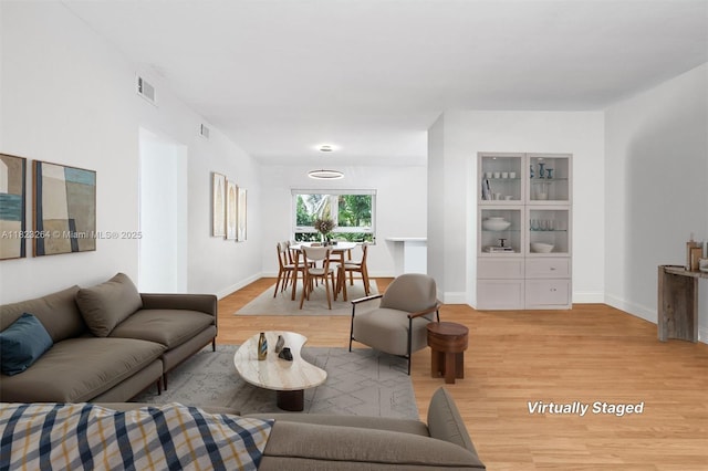 7700 SW 56th Ave Unit 2, Miami, FL 33143 - living area with light wood-style floors and baseboards