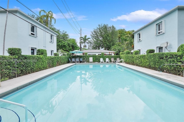 7700 SW 56th Ave Unit 2, Miami, FL 33143 - view of swimming pool with a fenced backyard