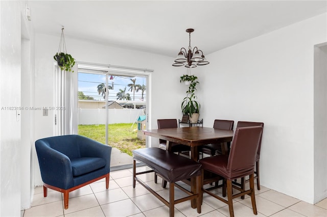 8851 NW 12th St, Pembroke Pines, FL 33024 - dining space featuring a chandelier and light tile patterned floors
