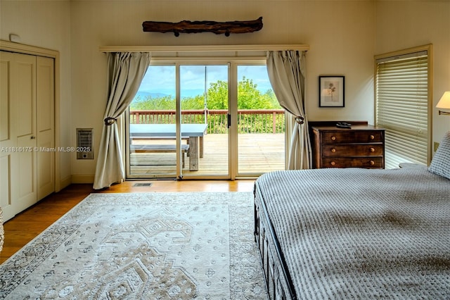 200 Summit Lodge Rd, Nc, NC 28604 - bedroom featuring access to exterior and wood finished floors