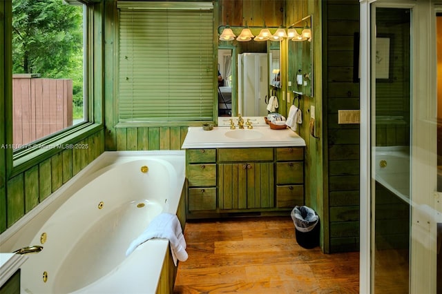 200 Summit Lodge Rd, Nc, NC 28604 - full bath featuring a whirlpool tub, vanity, and wood finished floors
