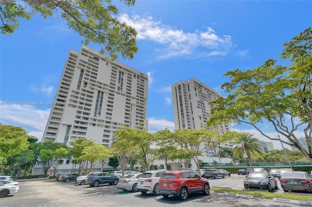 20225 NE 34th Ct Unit 1014, Aventura, FL 33180 - view of apartment building / complex featuring uncovered parking