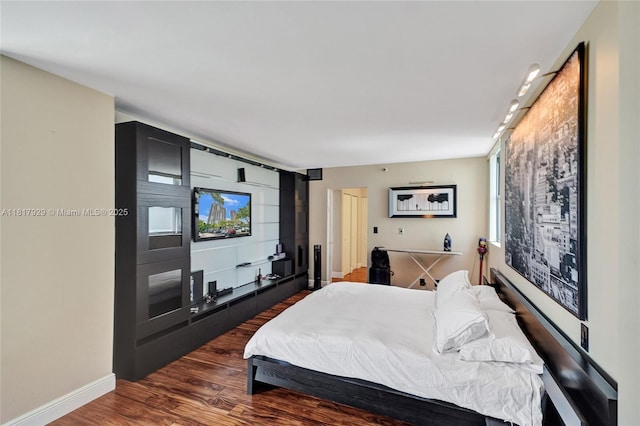 20225 NE 34th Ct Unit 1014, Aventura, FL 33180 - bedroom featuring dark wood-style floors and baseboards
