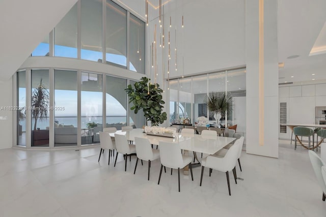 16901 Collins Ave Unit 5103, Sunny Isles Beach, FL 33160 - dining area with a high ceiling