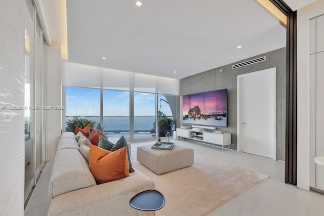 16901 Collins Ave Unit 5103, Sunny Isles Beach, FL 33160 - living area with finished concrete flooring and tile walls