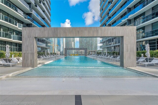 45 SW 9th St Unit 3403, Miami, FL 33130 - community pool featuring a patio