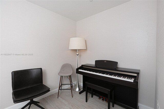 45 SW 9th St Unit 3403, Miami, FL 33130 - sitting room featuring wood finished floors and baseboards