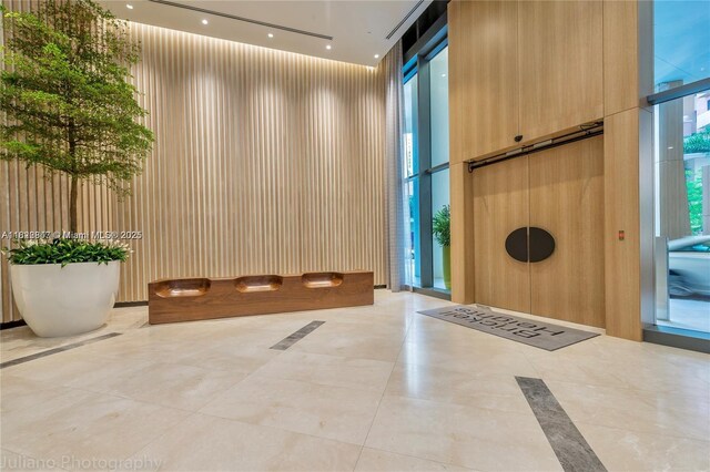 45 SW 9th St Unit 3403, Miami, FL 33130 - building lobby with expansive windows and a towering ceiling