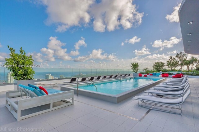 45 SW 9th St Unit 3403, Miami, FL 33130 - community pool with a patio area and a water view