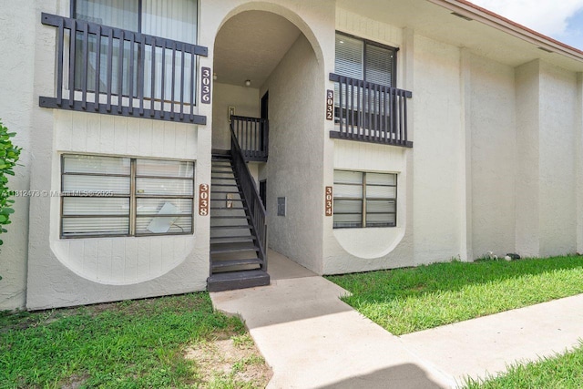 3032 Coral Ridge Dr Unit 217C, Coral Springs, FL 33065 - view of exterior entry with stucco siding