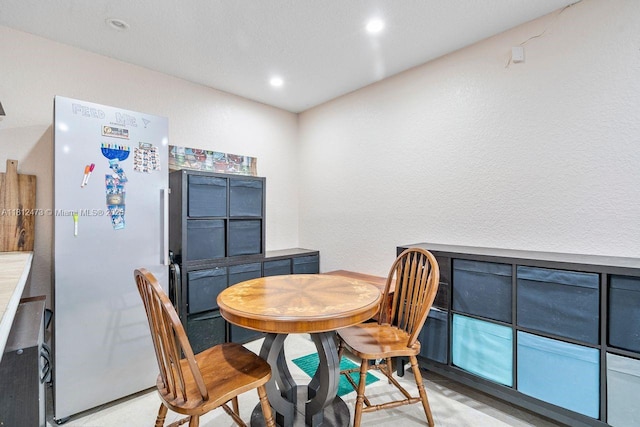 3032 Coral Ridge Dr Unit 217C, Coral Springs, FL 33065 - dining room featuring recessed lighting and a textured wall