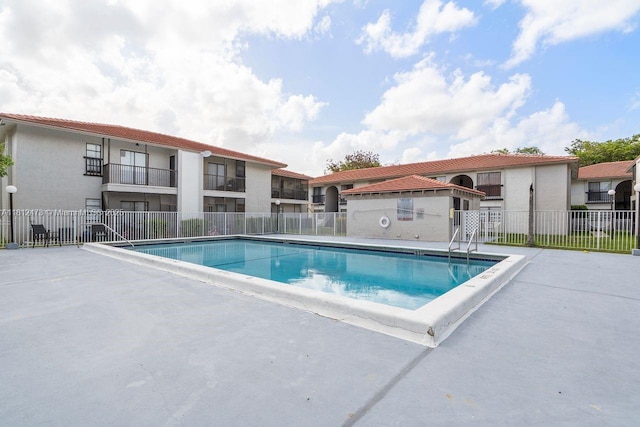 3032 Coral Ridge Dr Unit 217C, Coral Springs, FL 33065 - community pool featuring a patio area