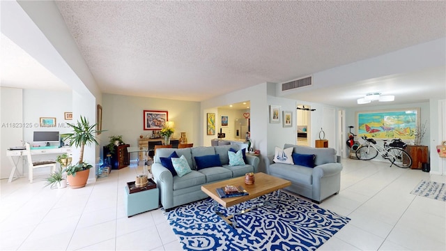 11111 Biscayne Blvd Unit 2G, Miami, FL 33181 - living area with light tile patterned flooring and a textured ceiling