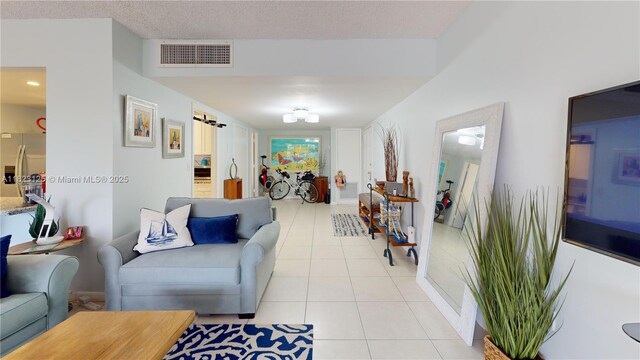 11111 Biscayne Blvd Unit 2G, Miami, FL 33181 - living room featuring light tile patterned flooring