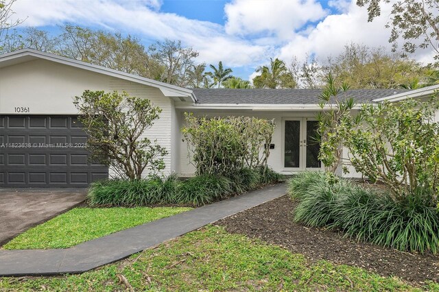 10361 SW 119th St, Miami, FL 33176 - single story home with french doors and a garage