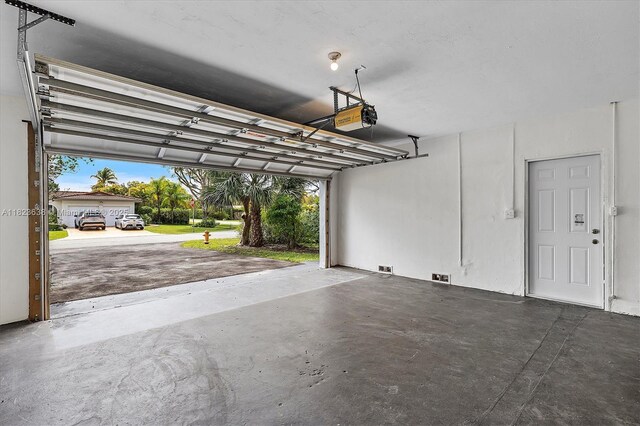 10361 SW 119th St, Miami, FL 33176 - garage featuring a garage door opener