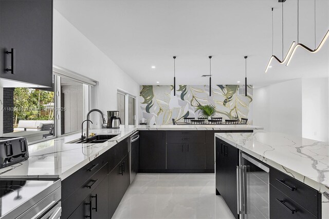 10361 SW 119th St, Miami, FL 33176 - kitchen with beverage cooler, dark cabinetry, recessed lighting, pendant lighting, and light stone counters