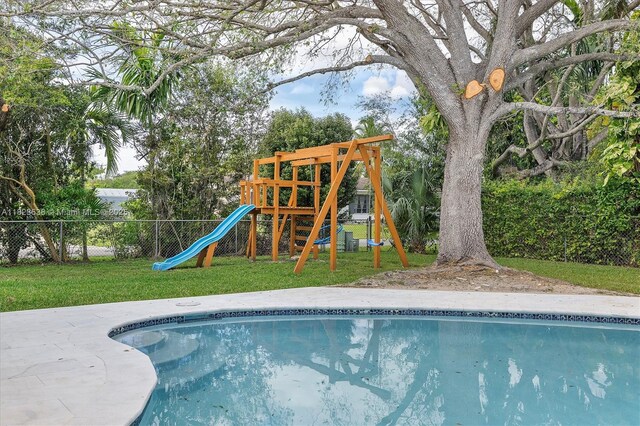 10361 SW 119th St, Miami, FL 33176 - view of swimming pool featuring a playground