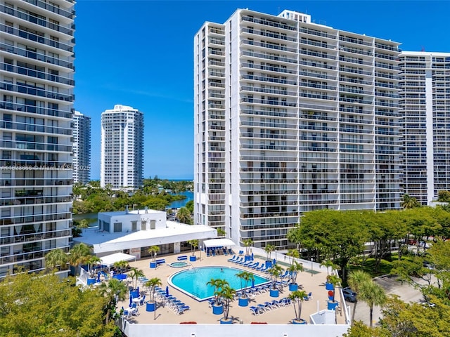 3731 N Country Club Dr Unit 2023, Aventura, FL 33180 - view of building exterior featuring a community pool and a view of city
